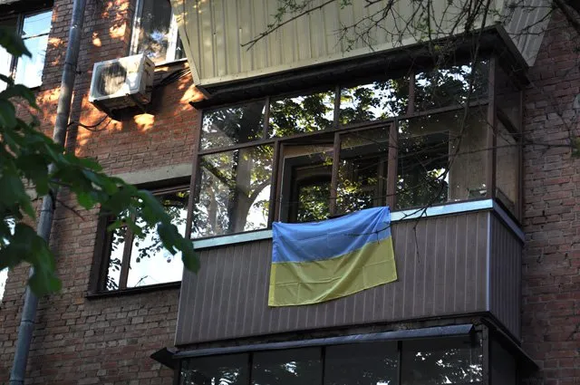 У Полтаві масово вивішують прапор України (Фоторепортаж) — фото 8