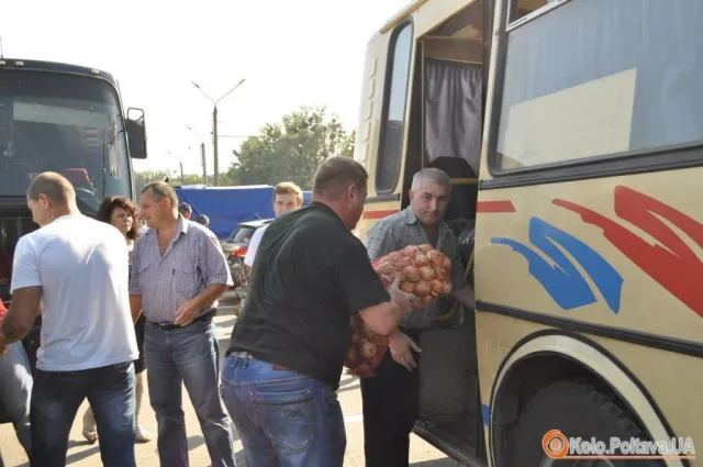 В зону АТО повезли дині та кавуни для військових (Фоторепортаж) — фото 8
